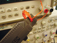 Figure 2-3. Improve probe sensitivity by winding several turns of the conductor under test around the probe